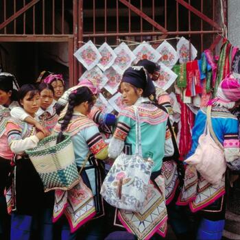 Hani women shop at a Yuanyang market (image credit: Jim Goodman)