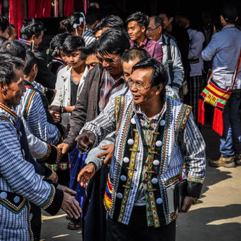 Burmese and Chinese Lisu meet at a church in Myitkyina, Myanmar