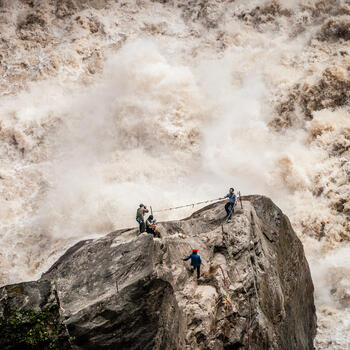 Time for a photo amidst the raging waters of the Yangtze River as it passes through Tiger Leaping Gorge (image credit: Yereth Jansen)