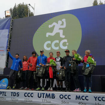 Yao Miao and Qi Min together on UTMB podium (image credit: Pavel Toropov)