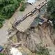 Mudslide submerges train station on Kunming-Hekou line